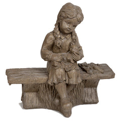 Photo of Small Girl on Bench with Cat - Marquis Gardens