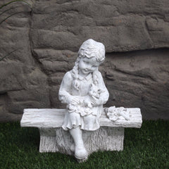 Photo of Small Girl on Bench with Cat - Marquis Gardens
