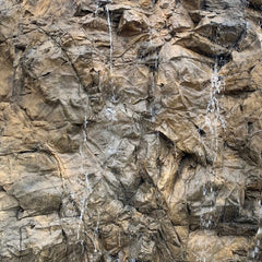 Wide-Angle view of Basalt Wall Panel, with water streaming down panel