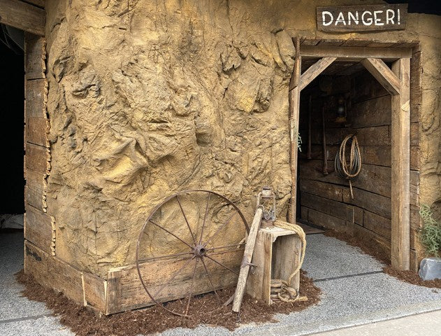 Old Time Mine Entrance With Cavern Wall Panel Covering Exterior of Entrance