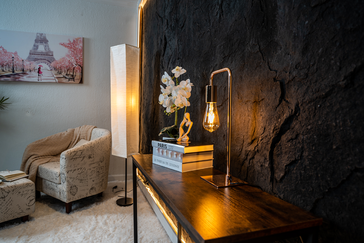 A Bedroom Wall With a desk. The Wall is covered with the Dragonstone Panel