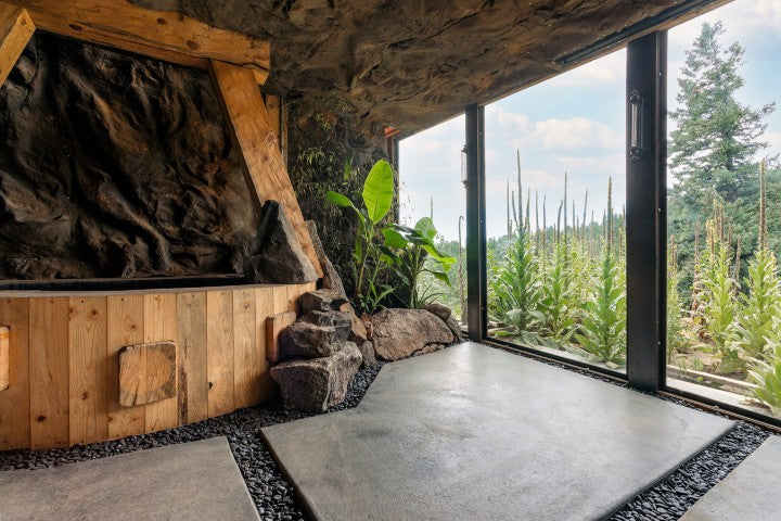 Malawi Panel mounted to Ceiling and Wall looking out towards large window and Garden