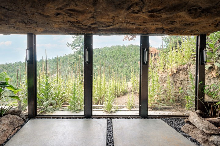 Malawi Panel mounted on inside Ceiling, overlooking large windows and crop fields