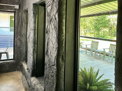 Slate Panel covering Interior wall of building doorway 