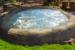 Photo of Universal Rocks In-Ground Spa - Lagoon - Marquis Gardens